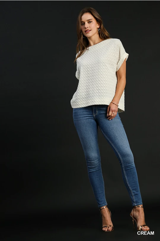 Umgee back button cream top